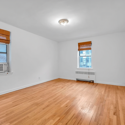 Empty bedroom used as the original in this illustrative comparison.